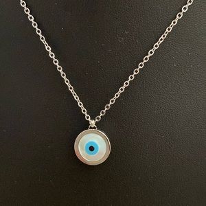 Stainless steel evil eye necklace.